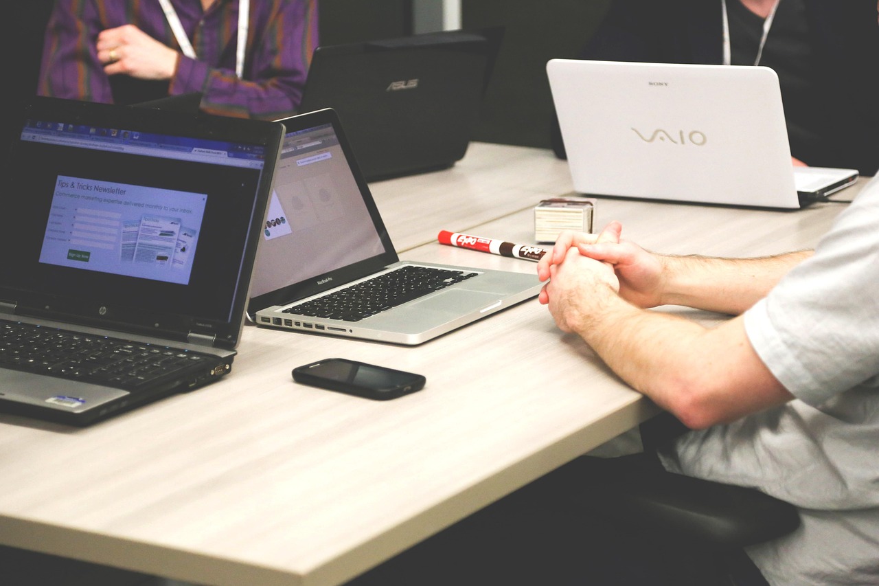 Laptop contact database and planning workspace for a new real estate agent